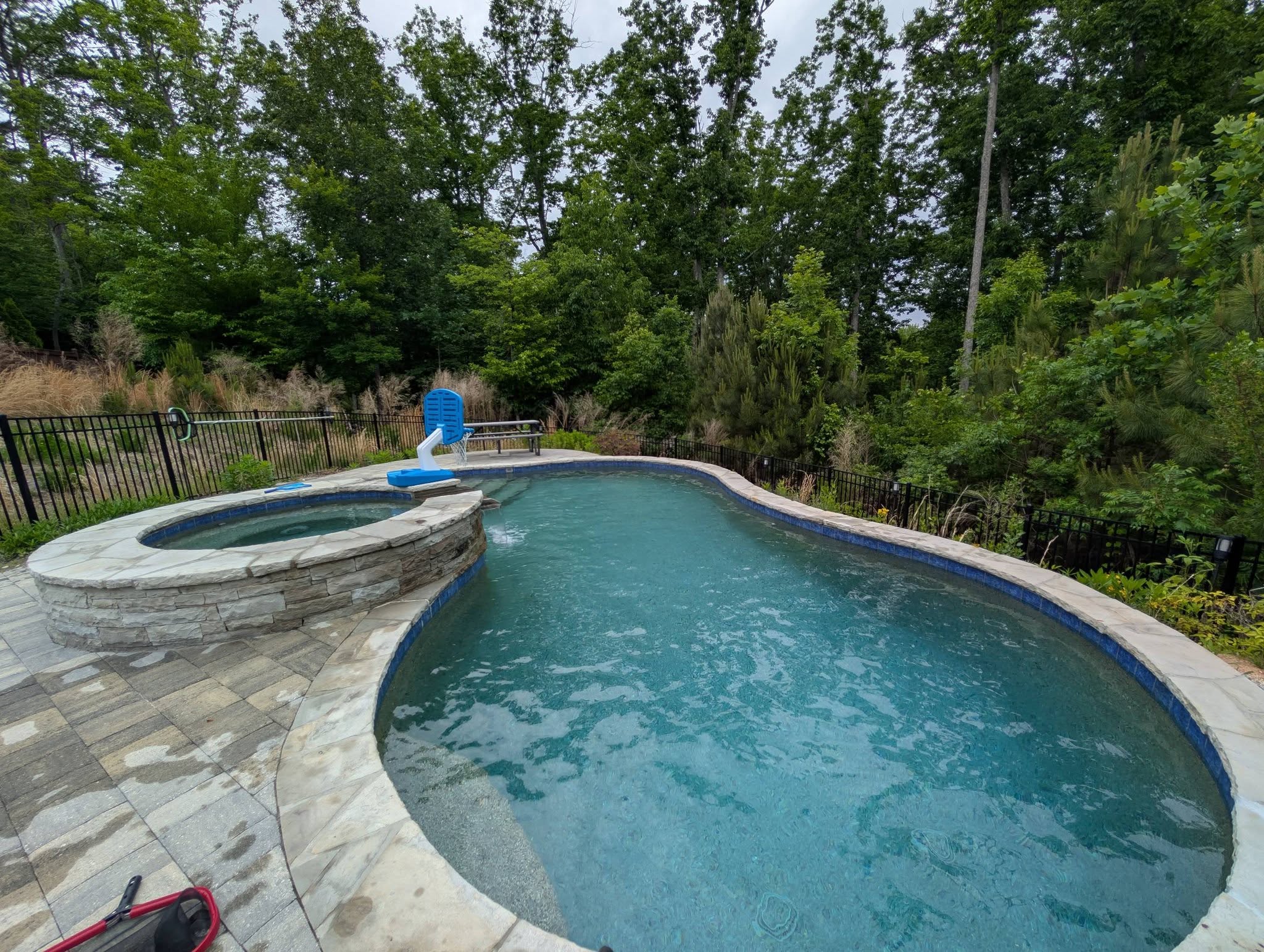 Residential pool and spa serviced by Peachy Pools in Kennesaw GA